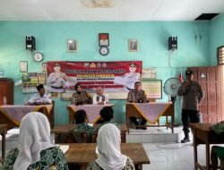 Polsek Sedati Bagikan Makan Siang Bergizi di SDN Segoro Tambak